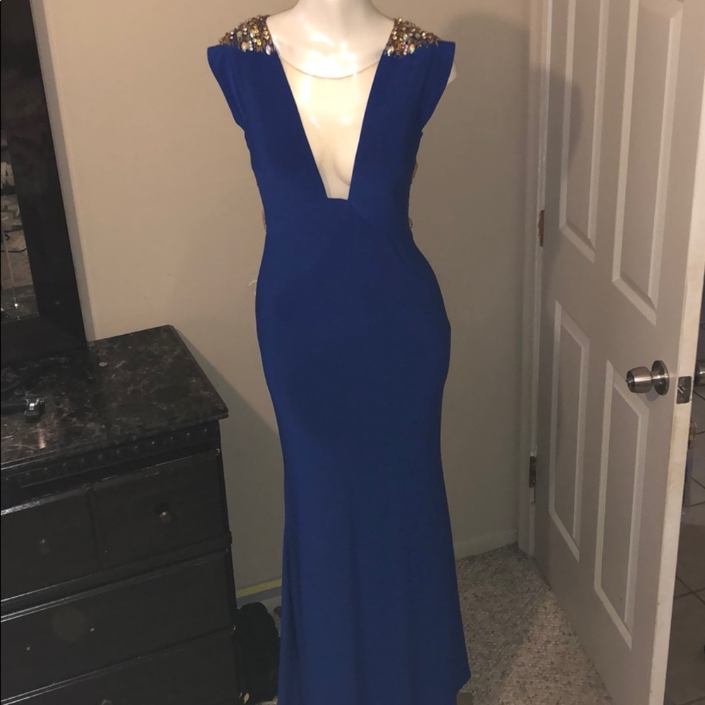 Beautiful royal blue gown with shoulder beads